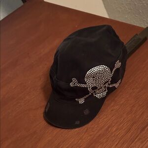 Edgy Black Cap with Silver Skull Design